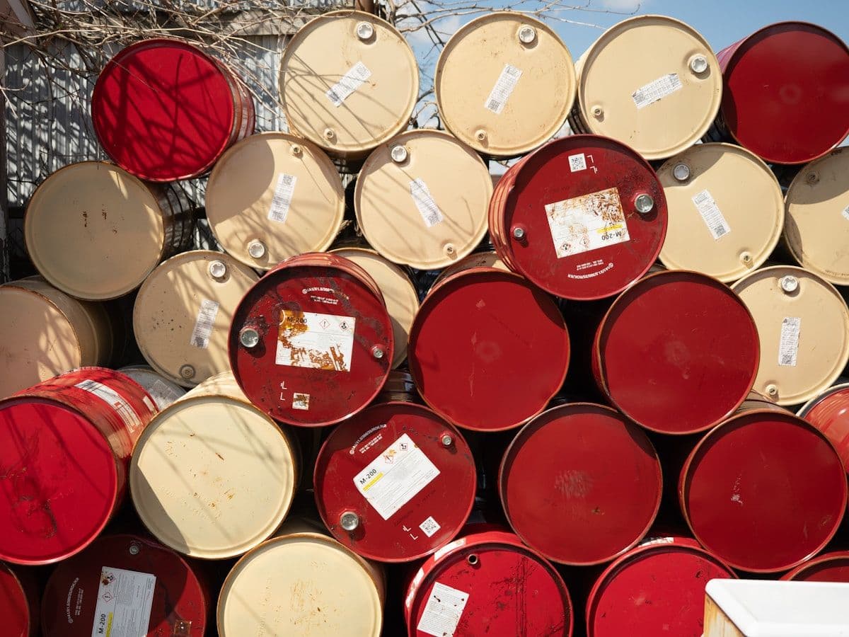 Labeled industrial drums prepared for controlled hazardous waste handling